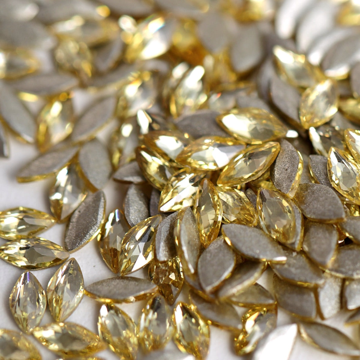Flatback zircon nail art marquise crystals in vibrant yellow color.
