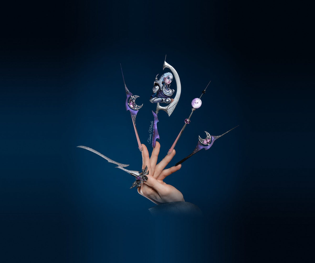 Fantasy nail art by Tamás Melinda with crescent moon nails, crystals and a sculpted warrior figure