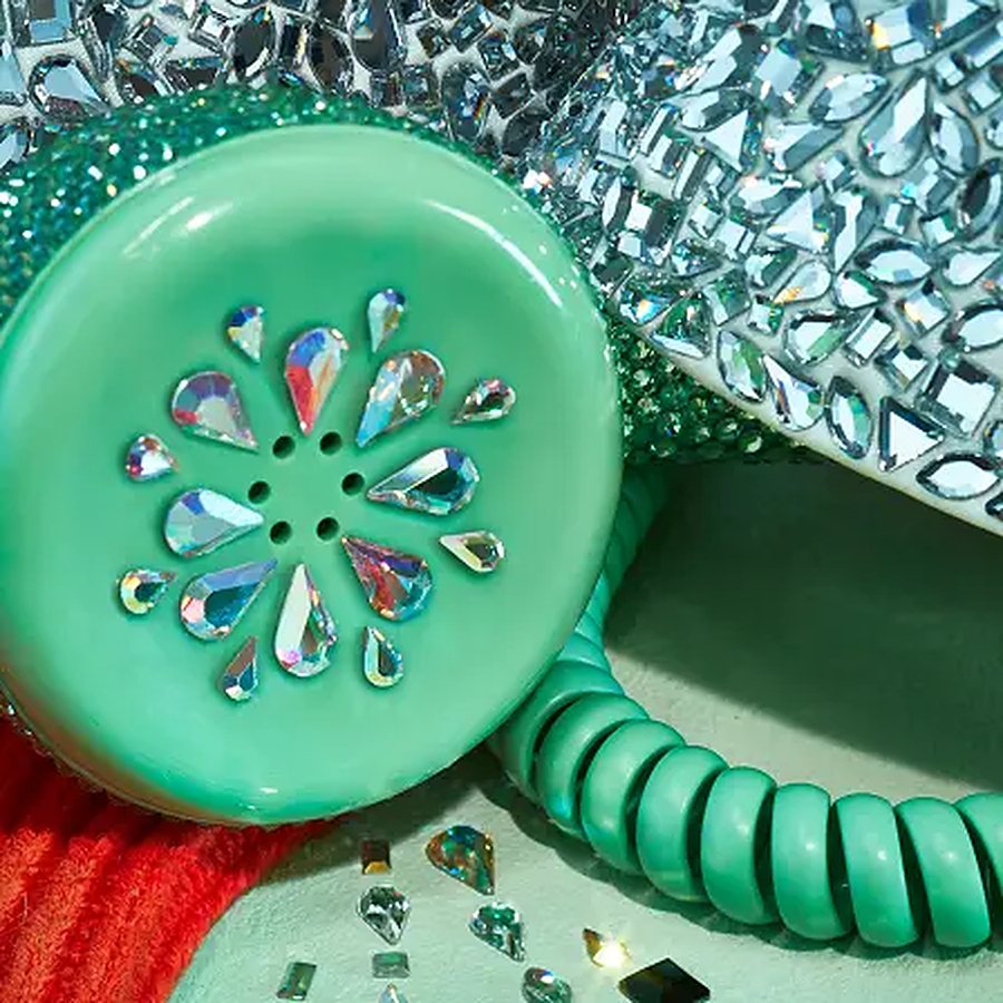 Mint green telephone receiver decorated with Swarovski crystals