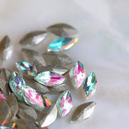 Faceted Aqua Pink Iridescent glass navette stones with pale aqua centre, pink shimmer and slightly curved backs.