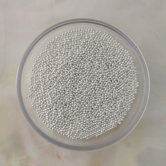 Silver metal caviar beads in multiple sizes for textured nail art, crystal borders and 3D nail designs.