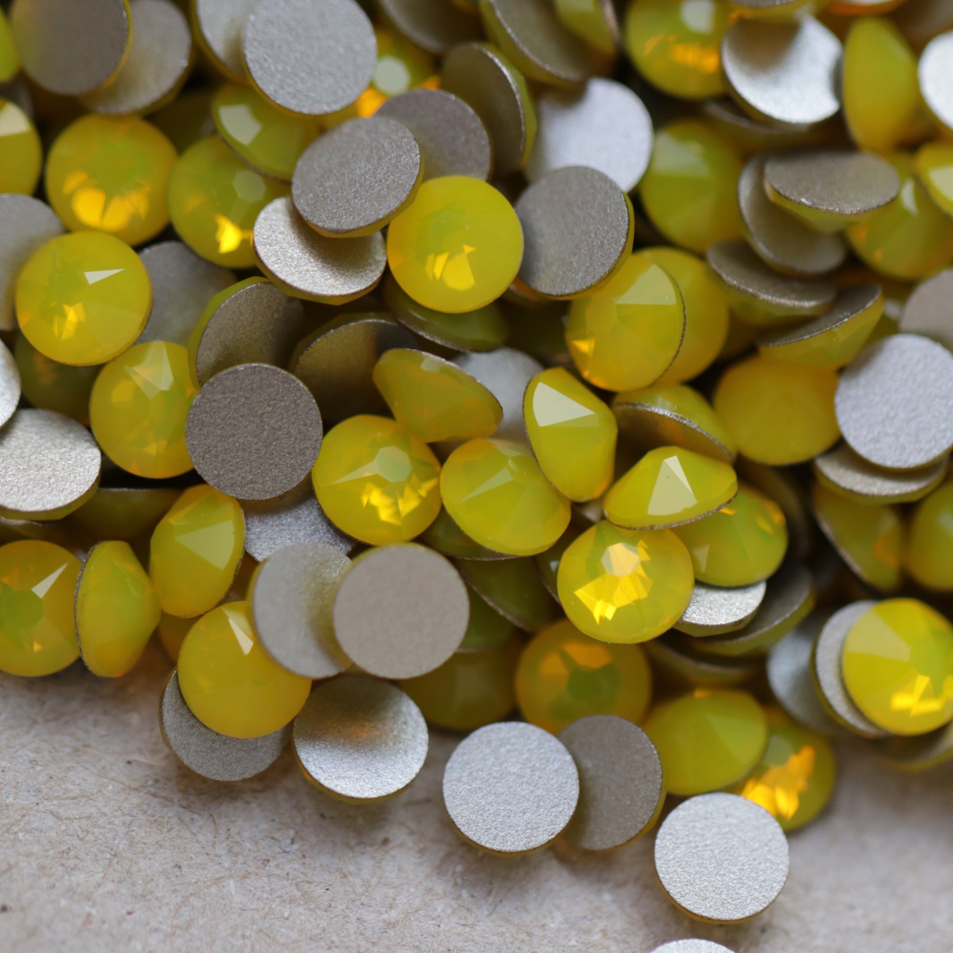 swarovski flatback crystal rhinestone in yellow opal color